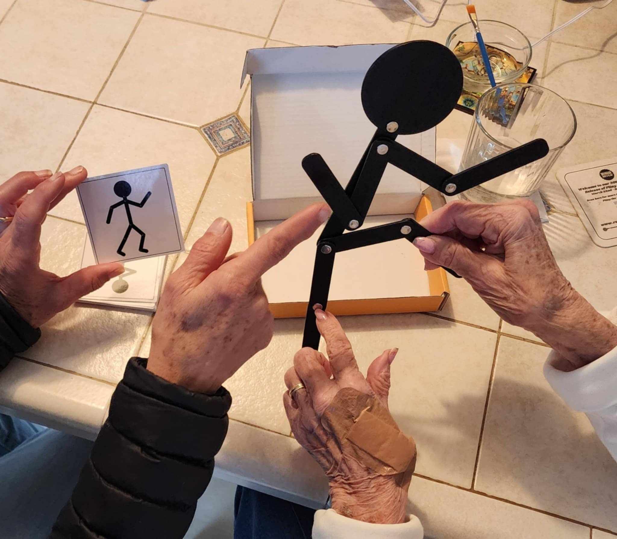 The popular stick figure activity shown here being used with a patient.