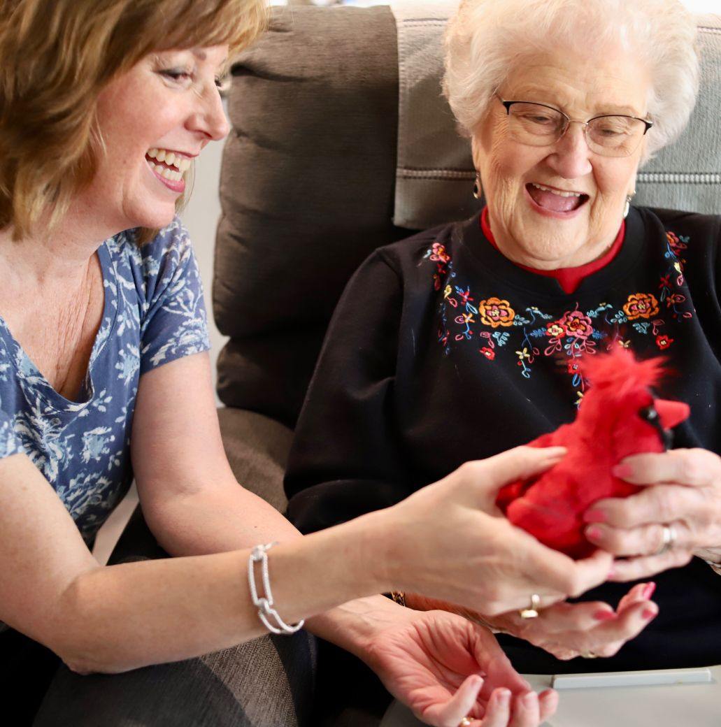 Kristie holding a Cardinal for her mom